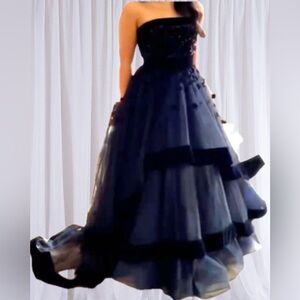 Stunning Mac Duggal Black Satin Gown. Tiered skirt and beaded velvet bodice.